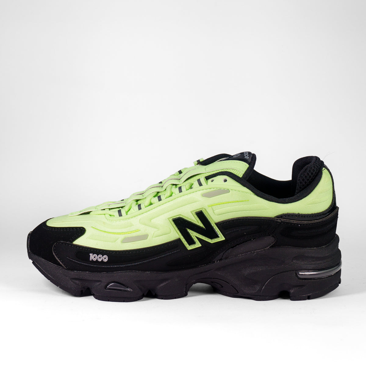 New Balance 1000D Black Mint Flash Neon Green — бічний профіль, чорна замша і неоновий верх