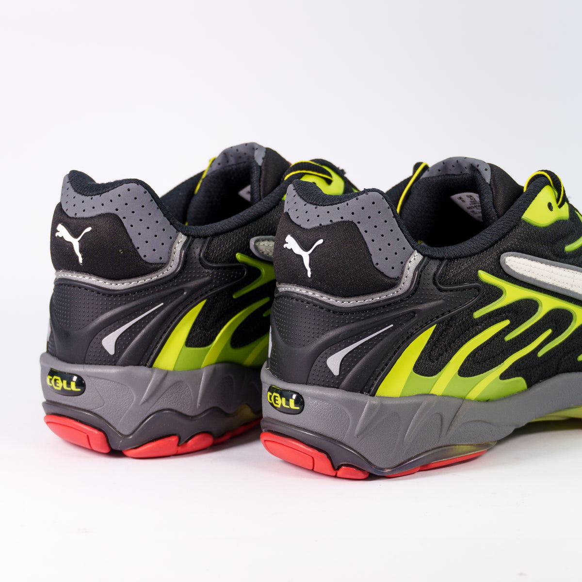Puma A$AP Rocky Inhale Mesh Lime Pow — вид ззаду: п'ятка з логотипом Puma, сіра проміжна підошва і червоний протектор
