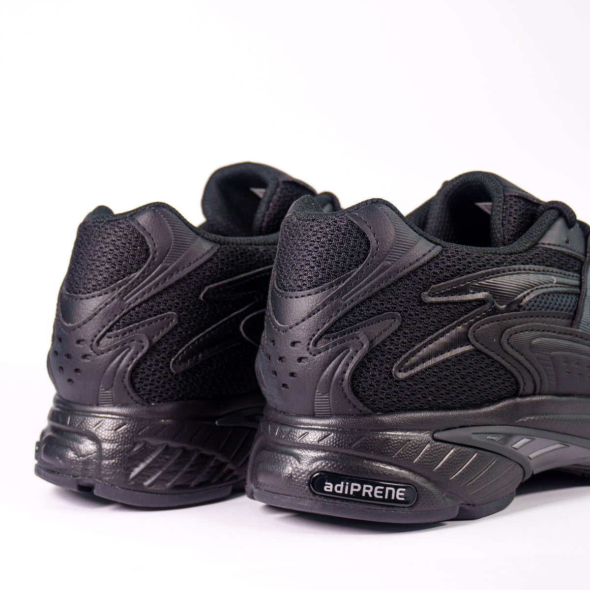 Adidas Temper Run 2.0 Full Black — вид ззаду, амортизація adiPRENE на п'ятці