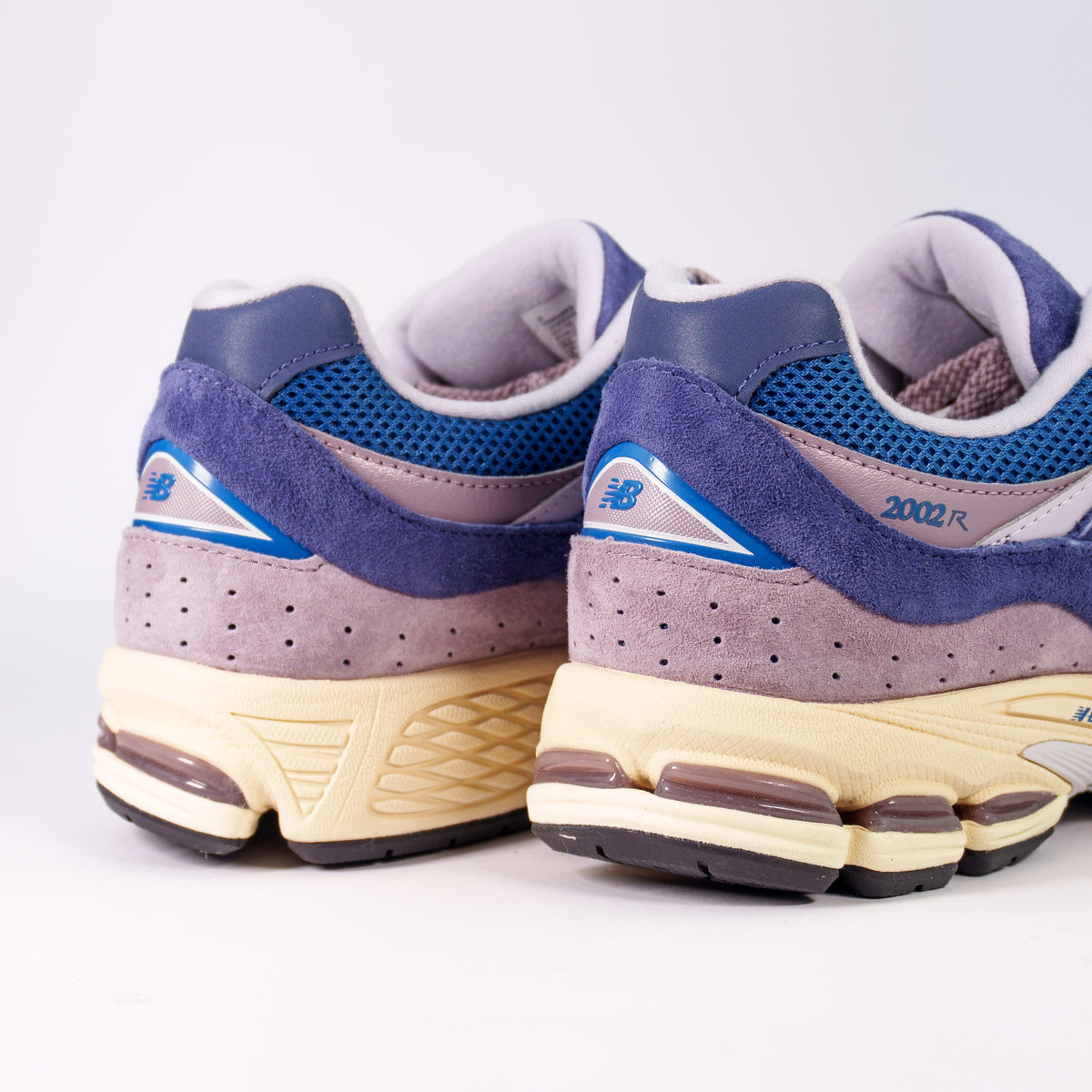 New Balance 2002R Dream State Blue Purple — вид ззаду, перфорована бузкова замша і капсули N-ergy